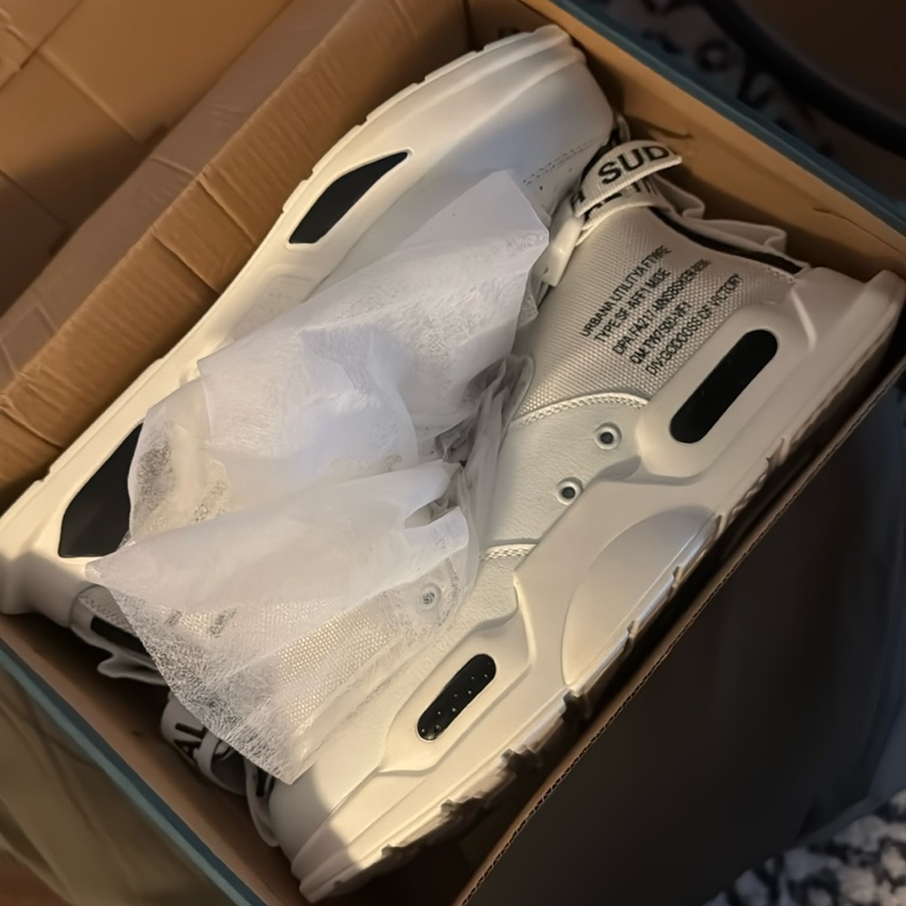 New in box men’s 46 or size 12 sneakers